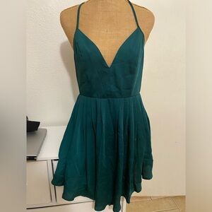 Green open back mini dress/ skater size Medium